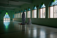 Prayers in a mosque, Kuala Lumpur, Malaysia - © Viviane Moos