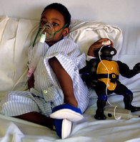 A young patient being treated for severe respiratory problems, New York hospital - © Viviane Moos