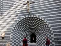 Architect Mario Botta's mountain church  in the small hamlet of Mogno,  Switzerland - © Viviane Moos