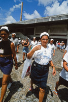 Brazilian factory workers leaving at the end of their shift - © Viviane Moos
