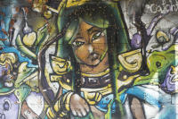 Green-eyed Mayan goddess on a park wall - © Viviane Moos