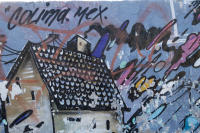 A painted house on a park wall  - © Viviane Moos