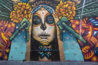 La CATRINA, symbol of The Day of the Dead on the wall of the town cemetery.  - © Viviane Moos