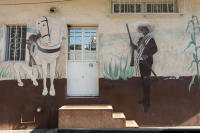 General Pancho Villa and his horse Seven Leagues painted on the side of a house in Old Town. - © Viviane Moos